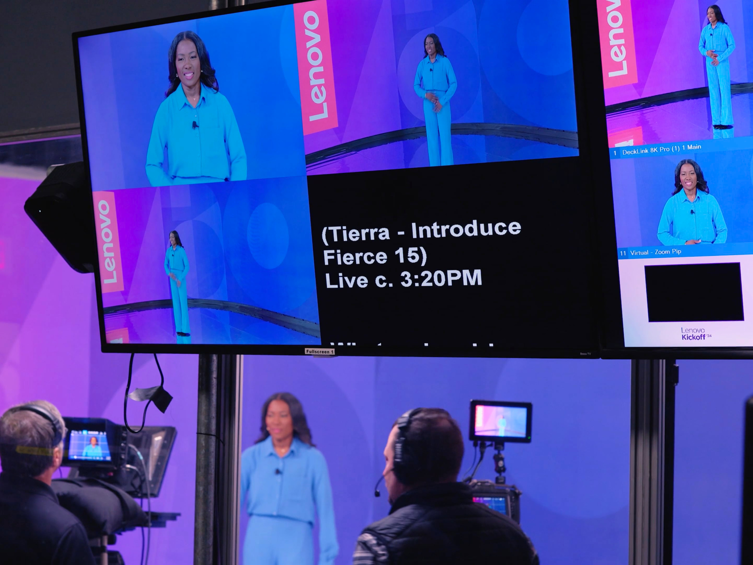Behind-the-scenes view of a live video production control monitor at TSEC Studio in Apex, NC, showing multiple camera angles of a presenter in a blue outfit on the Lenovo Kickoff '24 set, with a cue reading "(Tierra - Introduce Fierce 15) Live c. 3:20PM." In the foreground, two crew members operate camera equipment while the presenter rehearses on set.